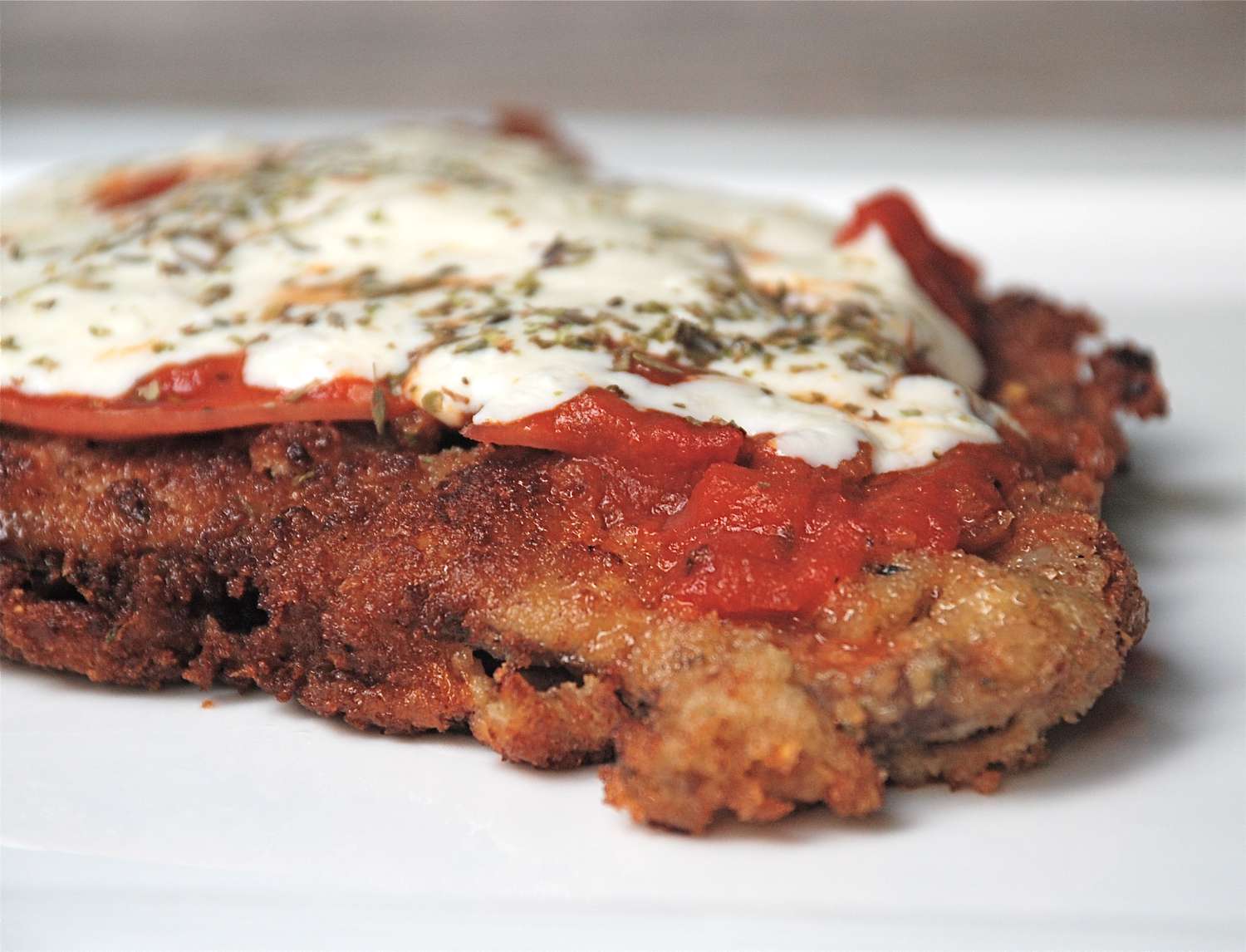 Milanesa a la Napolitana with Ham, Tomato Sauce and Melted Mozzarella